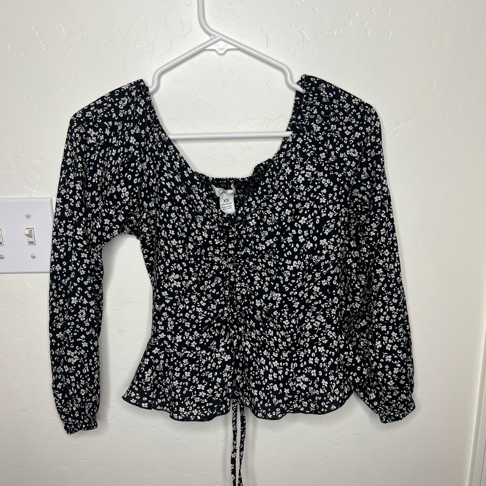 Black blouse w/ white flowers
